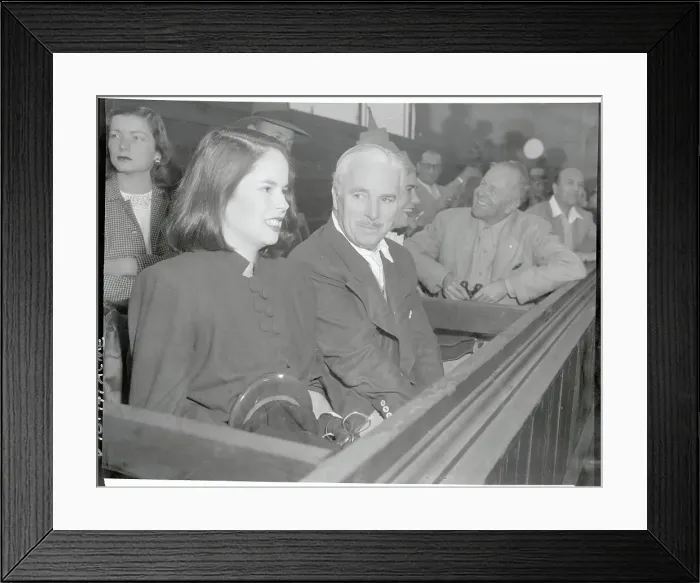 Framed Print : Charlie Chaplin and Wife Watching Tennis Match Framed Print : Charlie Chaplin and Wife Watching Tennis Match
