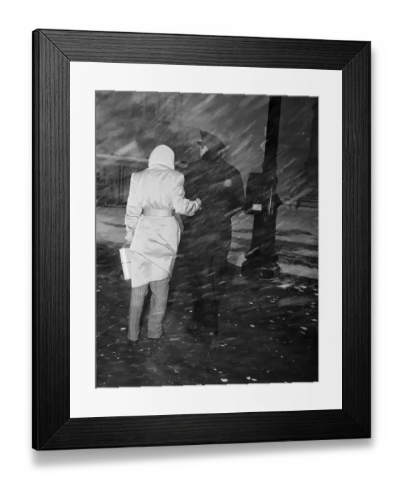 Framed Print : Couple Walking in a Snowstorm Framed Print : Couple Walking in a Snowstorm