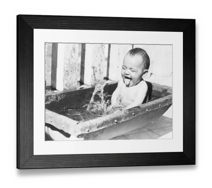 Framed Print : Baby Playing in Washtub Framed Print : Baby Playing in Washtub