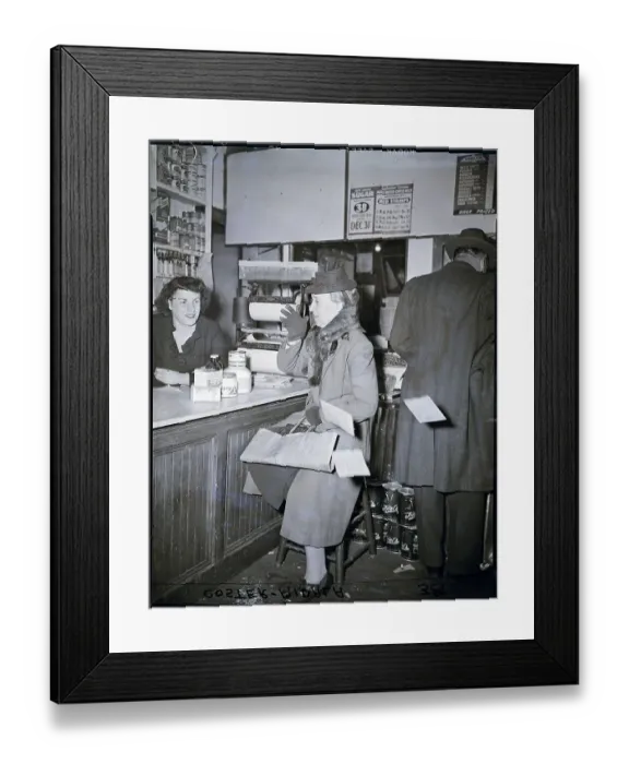 Framed Print : Woman Points Ration Book At Store Clerk Framed Print : Woman Points Ration Book At Store Clerk