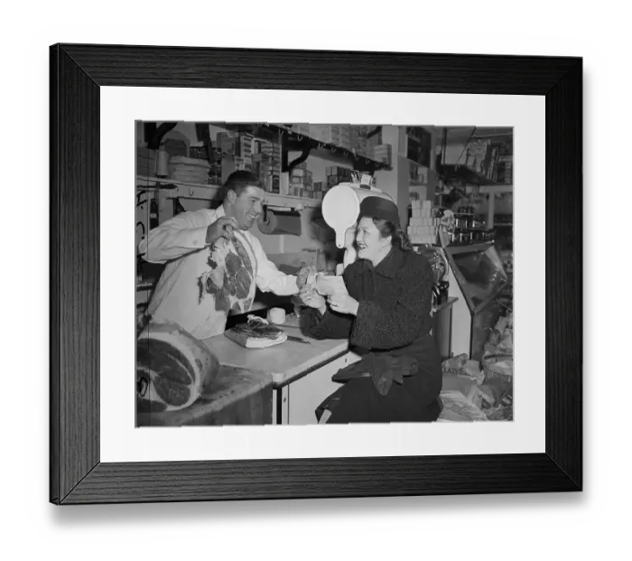 Framed Print : Butcher Shows Woman Large Steak Framed Print : Butcher Shows Woman Large Steak