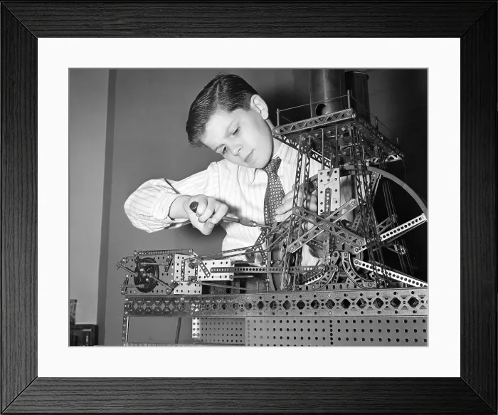 Framed Print : Boy Playing with Mechanical Set Framed Print : Boy Playing with Mechanical Set