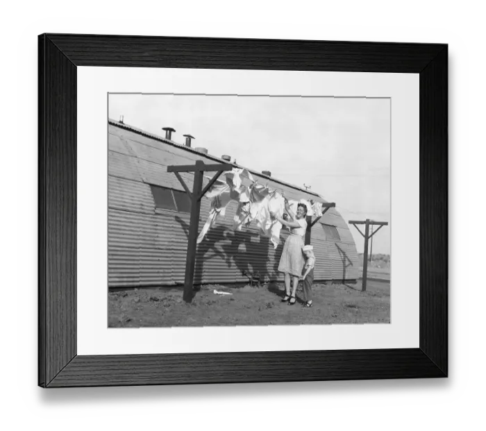 Framed Print : Woman Hangs Laundry On Line, Boy Hides Framed Print : Woman Hangs Laundry On Line, Boy Hides