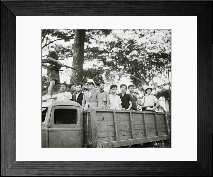 Framed Print : French Soldier With Annimite Prisoners Framed Print : French Soldier With Annimite Prisoners