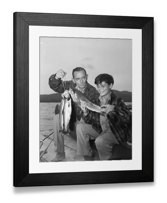 Framed Print : Father And Son Sitting With Salmon Framed Print : Father And Son Sitting With Salmon