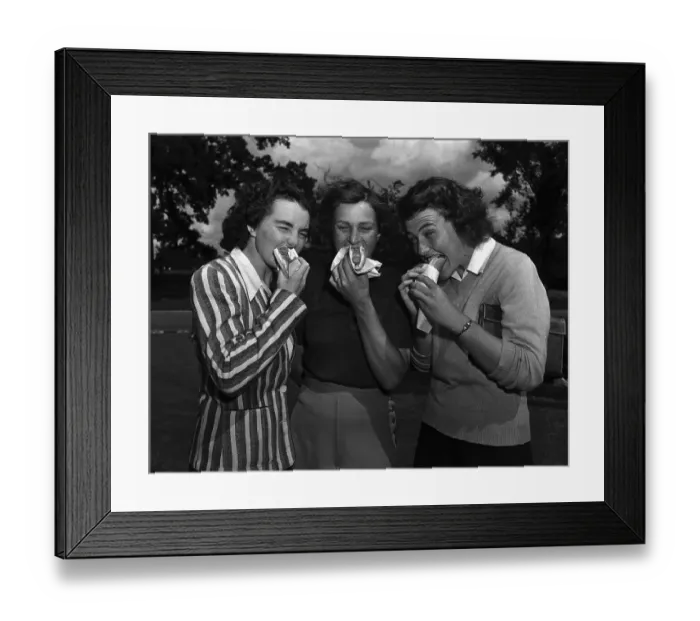 Framed Print : Women Golfers Eating Hot Dogs Framed Print : Women Golfers Eating Hot Dogs