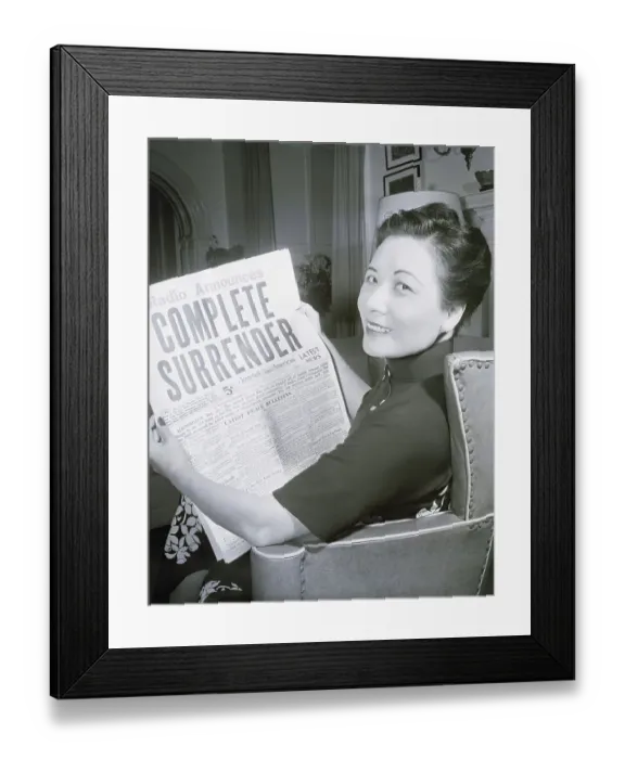 Framed Print : Mme. Chiang Kai-Shek Looking At Headline Framed Print : Mme. Chiang Kai-Shek Looking At Headline