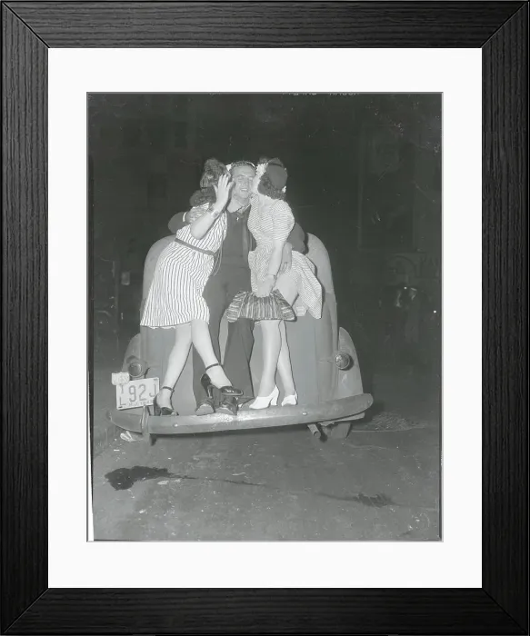 Framed Print : Women Kissing Soldier During Victory Celebration Framed Print : Women Kissing Soldier During Victory Celebration