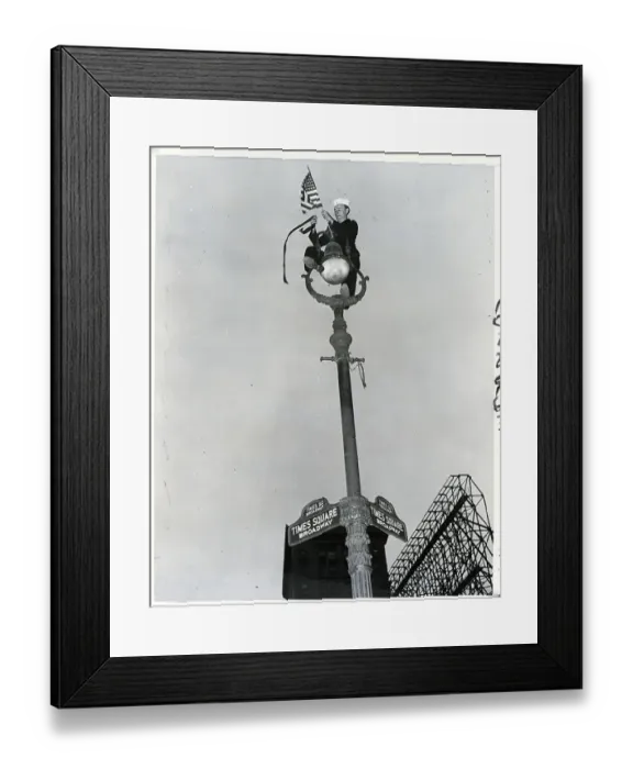 Framed Print : Sailor On Light Post With Flag Framed Print : Sailor On Light Post With Flag
