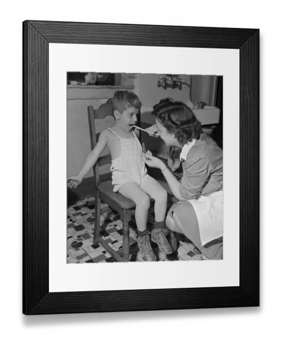 Framed Print : Visiting Nurse Checking Throat of Boy Framed Print : Visiting Nurse Checking Throat of Boy