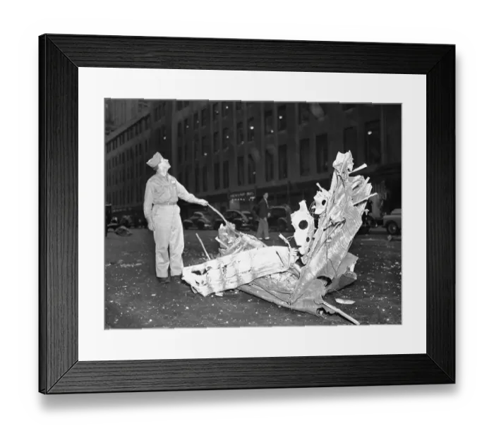 Framed Print : Man Looking at Plane Crash Debris Framed Print : Man Looking at Plane Crash Debris