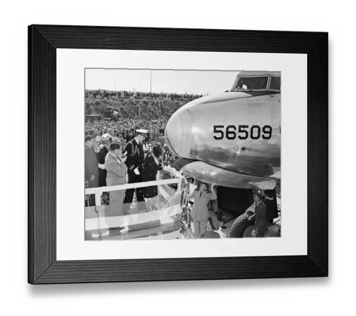 Framed Print : Mrs. Truman Trying To Break a Champagne Bottle on Plane Framed Print : Mrs. Truman Trying To Break a Champagne Bottle on Plane
