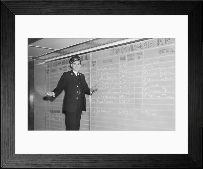Framed Print : Trainman Stands Before Arrival Board Framed Print : Trainman Stands Before Arrival Board