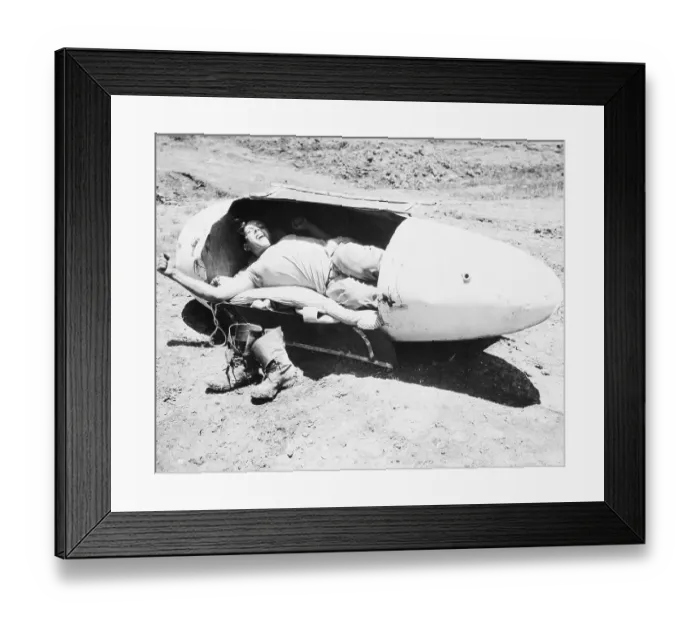 Framed Print : American Soldier in Makeshift Bed of the Field Framed Print : American Soldier in Makeshift Bed of the Field