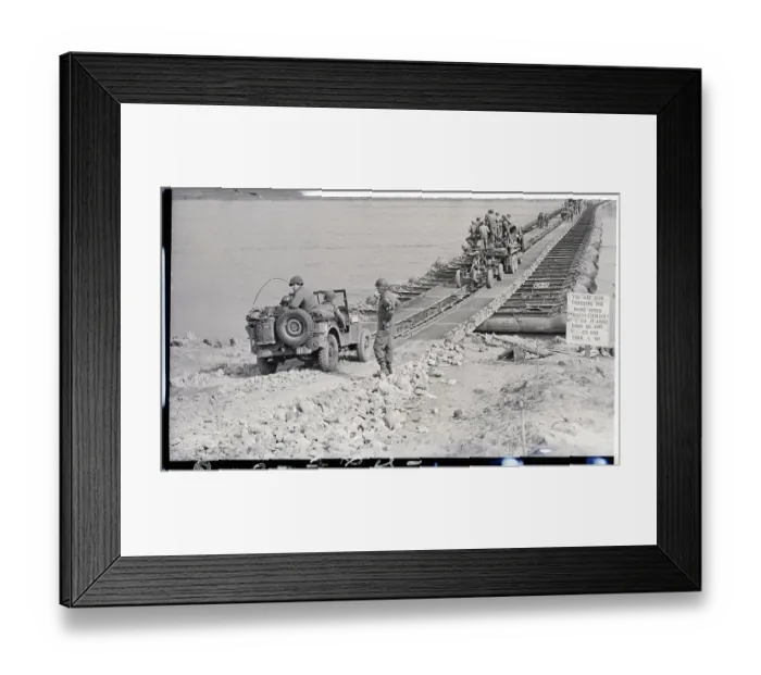Framed Print : Men, Guns, Vehicles Crossing A Bridge Framed Print : Men, Guns, Vehicles Crossing A Bridge