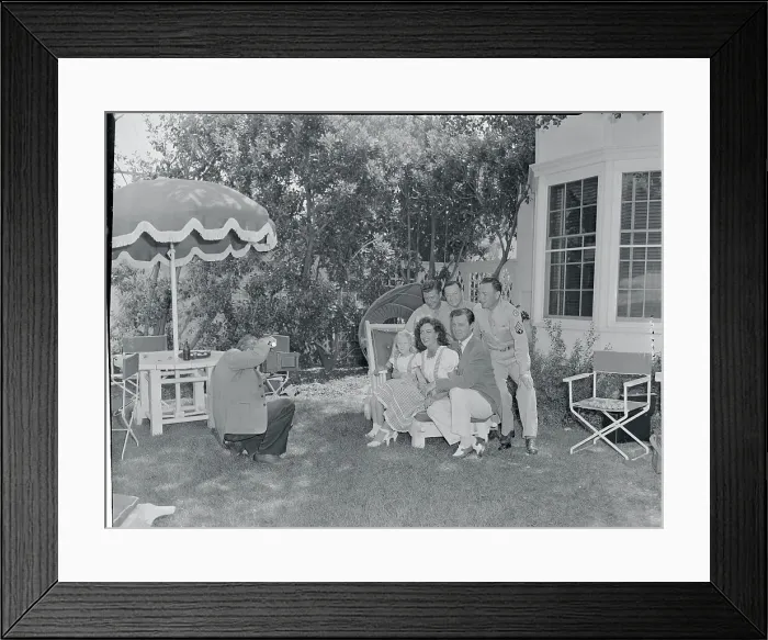 Framed Print : Joan Crawford and Guests Being Photographed Framed Print : Joan Crawford and Guests Being Photographed