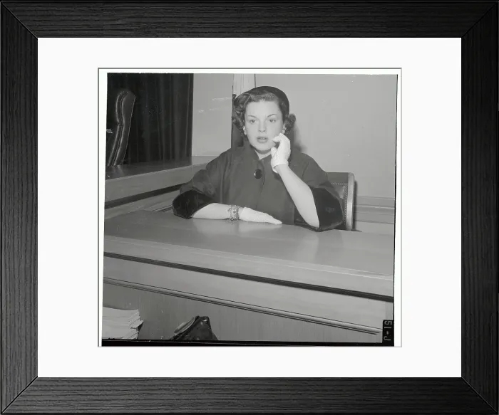 Framed Print : Judy Garland Sitting in Testimony Booth Framed Print : Judy Garland Sitting in Testimony Booth
