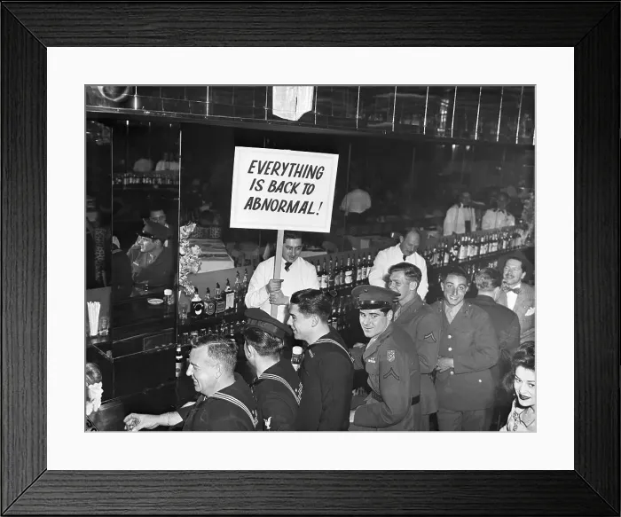 Framed Print : Cafe Zanzibar, Man Holds Up Sign Framed Print : Cafe Zanzibar, Man Holds Up Sign