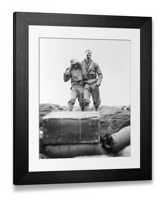 Framed Print : Wounded Soldier Helped To The Beach Framed Print : Wounded Soldier Helped To The Beach