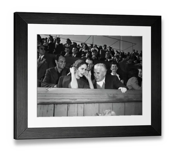 Framed Print : Charlie and Oona Chaplin Watching a Tennis Match Framed Print : Charlie and Oona Chaplin Watching a Tennis Match