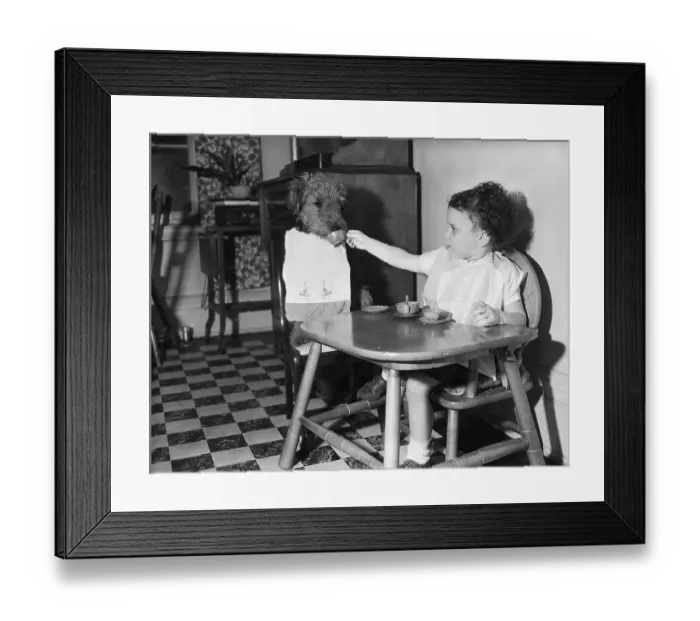 Framed Print : Girl Having Tea with Her Pet Dog Framed Print : Girl Having Tea with Her Pet Dog