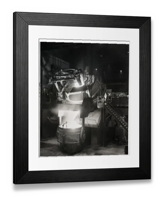 Framed Print : Electric Furnace Tilts To Pour Contents Framed Print : Electric Furnace Tilts To Pour Contents