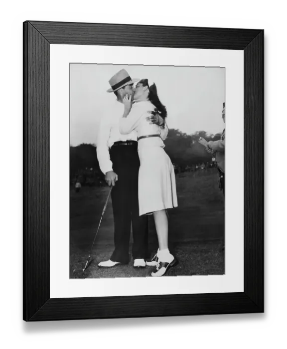 Framed Print : Sammy Snead and Golf Open Hostess Kissing on the Green Framed Print : Sammy Snead and Golf Open Hostess Kissing on the Green