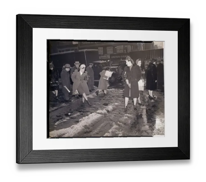 Framed Print : Woman Walking Through Slushy Street Framed Print : Woman Walking Through Slushy Street