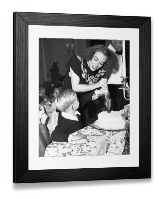 Framed Print : Joan Crawford Helping Son Cut Birthday Cake Framed Print : Joan Crawford Helping Son Cut Birthday Cake