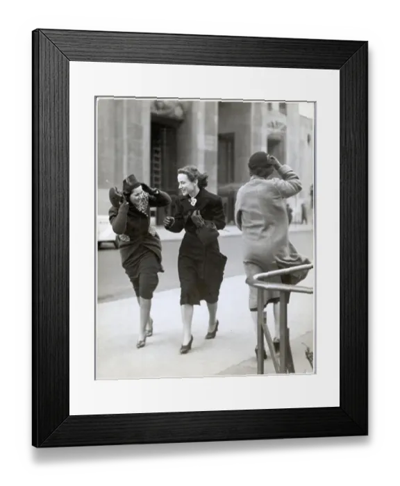Framed Print : Women Walk Against the Wind Framed Print : Women Walk Against the Wind