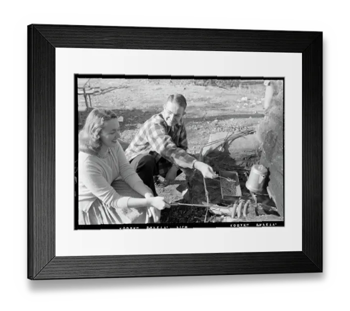 Framed Print : Couple Roasting Hot Dogs on Flame Stove Framed Print : Couple Roasting Hot Dogs on Flame Stove