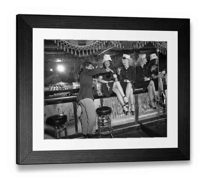 Framed Print : Man Pours Champagne for Ladies Framed Print : Man Pours Champagne for Ladies