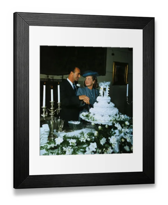 Framed Print : Betty Davis with New Husband Cutting Cake Framed Print : Betty Davis with New Husband Cutting Cake