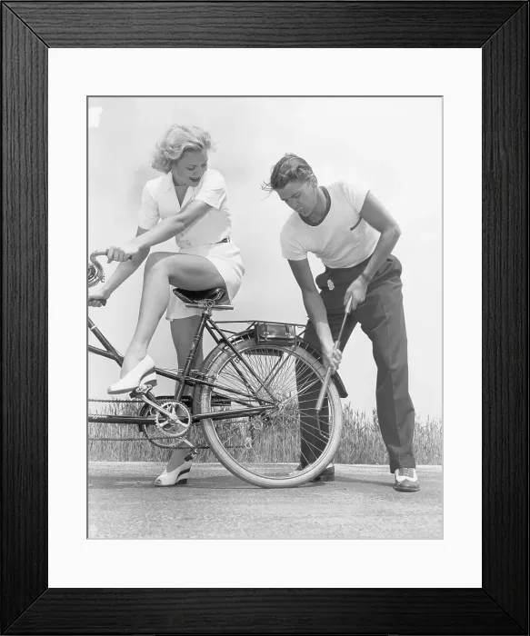 Framed Print : Ronald Reagan Pumping Bicycle Tire for Jane Wyman Framed Print : Ronald Reagan Pumping Bicycle Tire for Jane Wyman