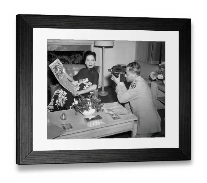 Framed Print : Mrs. Chiang Kai-Shek Holds Paper For Pho Framed Print : Mrs. Chiang Kai-Shek Holds Paper For Pho