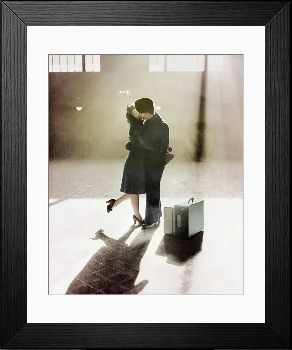 Framed Print : Couple Kissing in Train Station