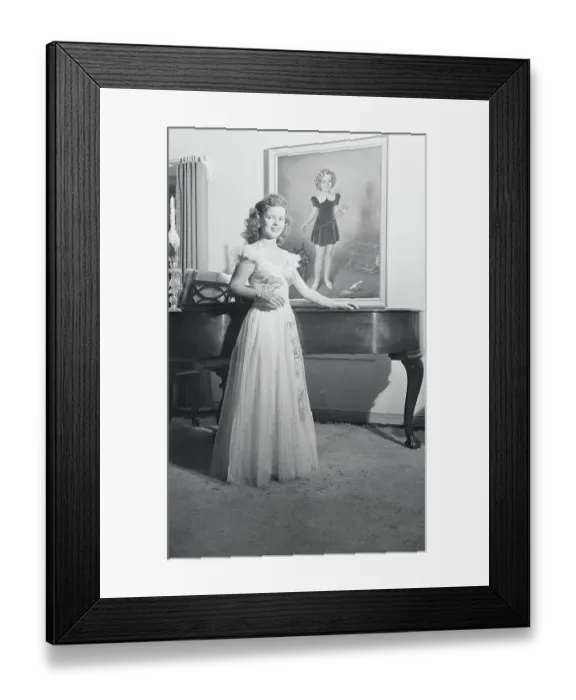 Framed Print : Shirley Temple Modeling Dress by Piano Framed Print : Shirley Temple Modeling Dress by Piano