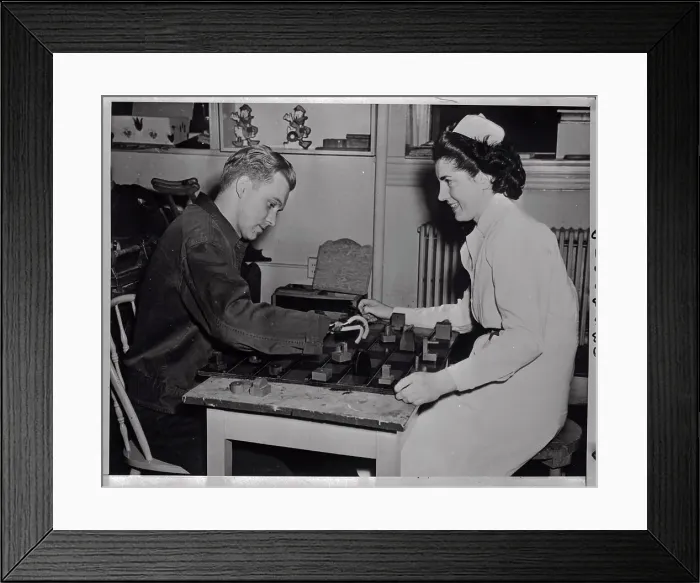Framed Print : Rehabilitating Soldier Learning to Use His Prosthetic Fingers Framed Print : Rehabilitating Soldier Learning to Use His Prosthetic Fingers