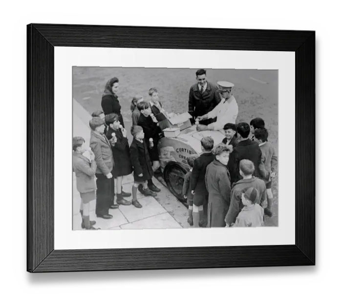 Framed Print : Ice Cream Vendor Serving Children Framed Print : Ice Cream Vendor Serving Children