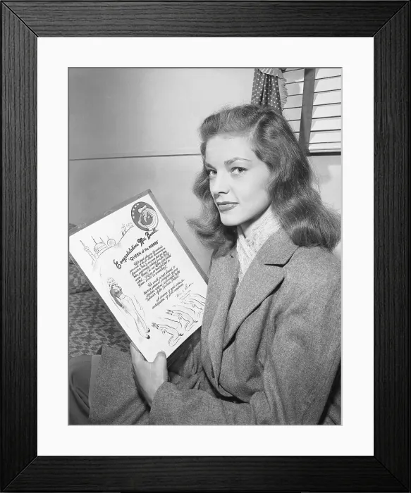 Framed Print : Actress Lauren Bacall Holding Plaque Framed Print : Actress Lauren Bacall Holding Plaque