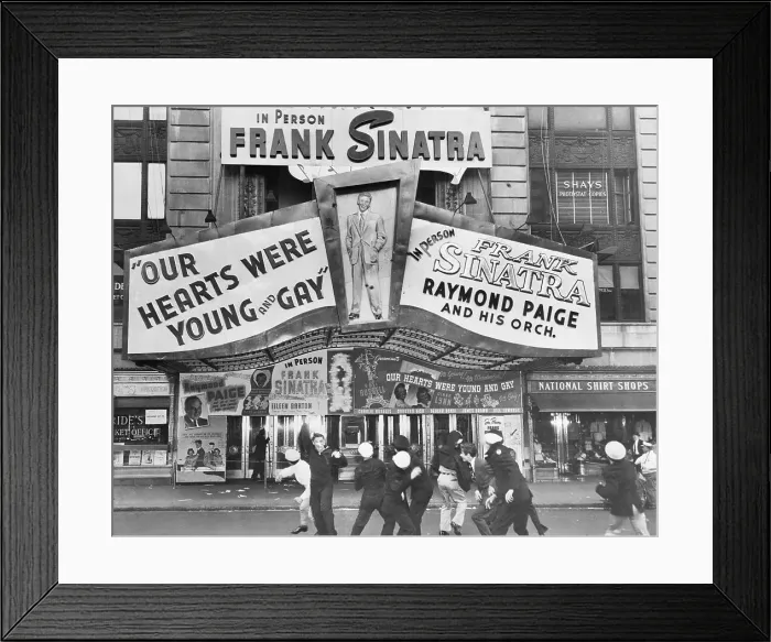 Framed Print : People Throwing Tomatoes at a Theater Framed Print : People Throwing Tomatoes at a Theater