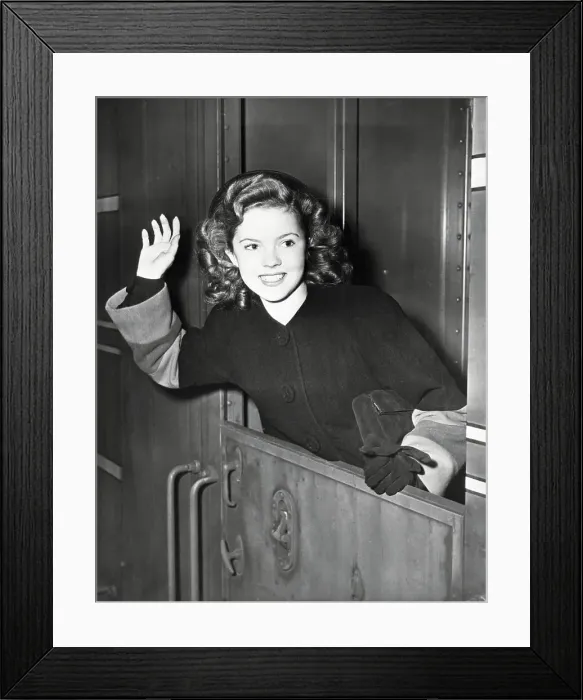 Framed Print : Actress Shirley Temple Waving from Train Framed Print : Actress Shirley Temple Waving from Train