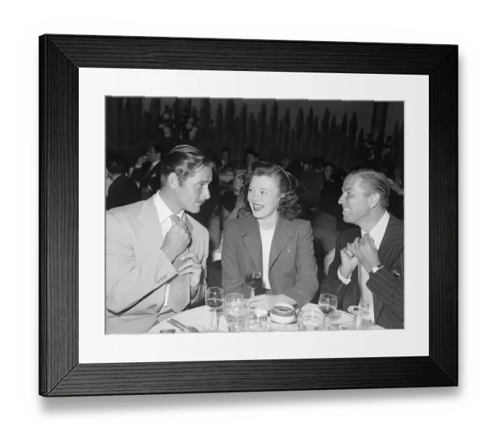 Framed Print : Errol Flynn and Bruce Cabot Adjust Ties Framed Print : Errol Flynn and Bruce Cabot Adjust Ties