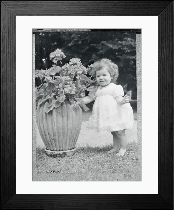 Framed Print : Princess Christina Posing Near Flowers Framed Print : Princess Christina Posing Near Flowers