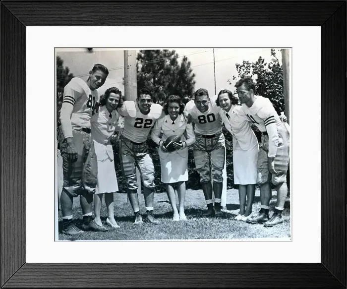 Framed Print : Football Players With Women in Uniforms Framed Print : Football Players With Women in Uniforms