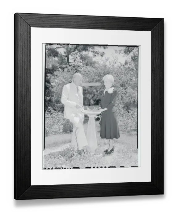 Framed Print : Cecil B. DeMille and Wife Standing at Outside Fountain Framed Print : Cecil B. DeMille and Wife Standing at Outside Fountain
