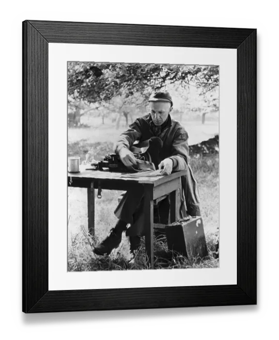Framed Print : Ernie Pyle Working at a Desk Framed Print : Ernie Pyle Working at a Desk