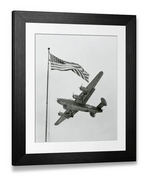 Framed Print : USAAF B-24 Liberator Bomber Flying Over US Flag Framed Print : USAAF B-24 Liberator Bomber Flying Over US Flag