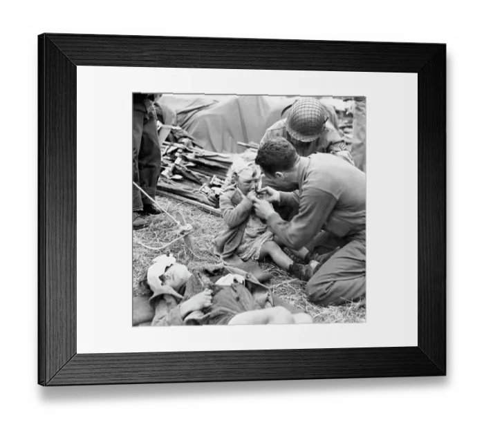 Framed Print : Medical Corpsman Gives Injured Child Candy Framed Print : Medical Corpsman Gives Injured Child Candy