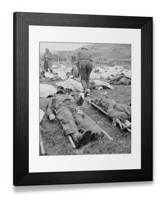 Framed Print : Slain US Soldiers Being Tagged on D-Day Battlefield 1944 Framed Print : Slain US Soldiers Being Tagged on D-Day Battlefield 1944